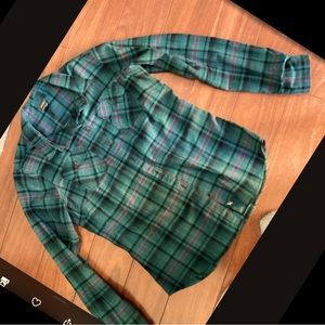 Plaid flannel shirt.